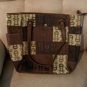 Anger purse, brown, Black and Tan. Looks like new! Well taken care of.